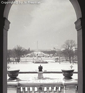 the view looking out over a crowded Mall towards the Washington Monument