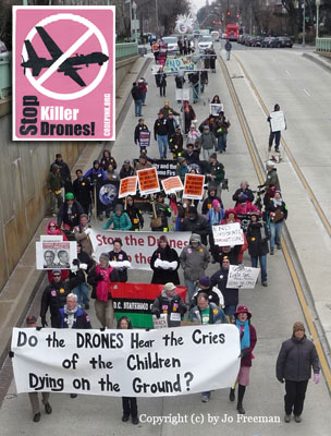 people protesting drones use an underpass