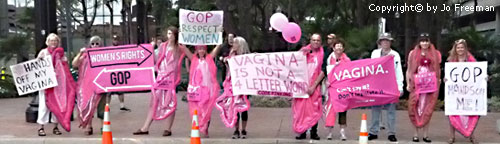 Code Pink protestors holding signs