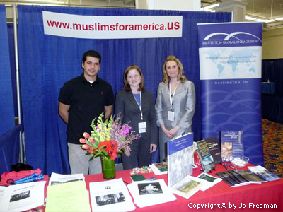 Muslims For America at a cluttered table